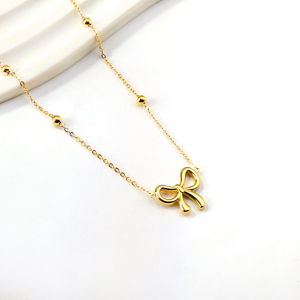 Gold Bow Pendant Necklace